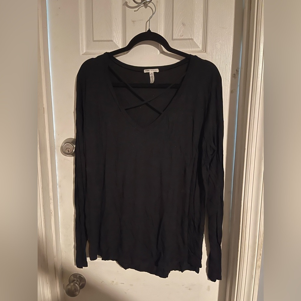 Black top with criss cross chest detailing